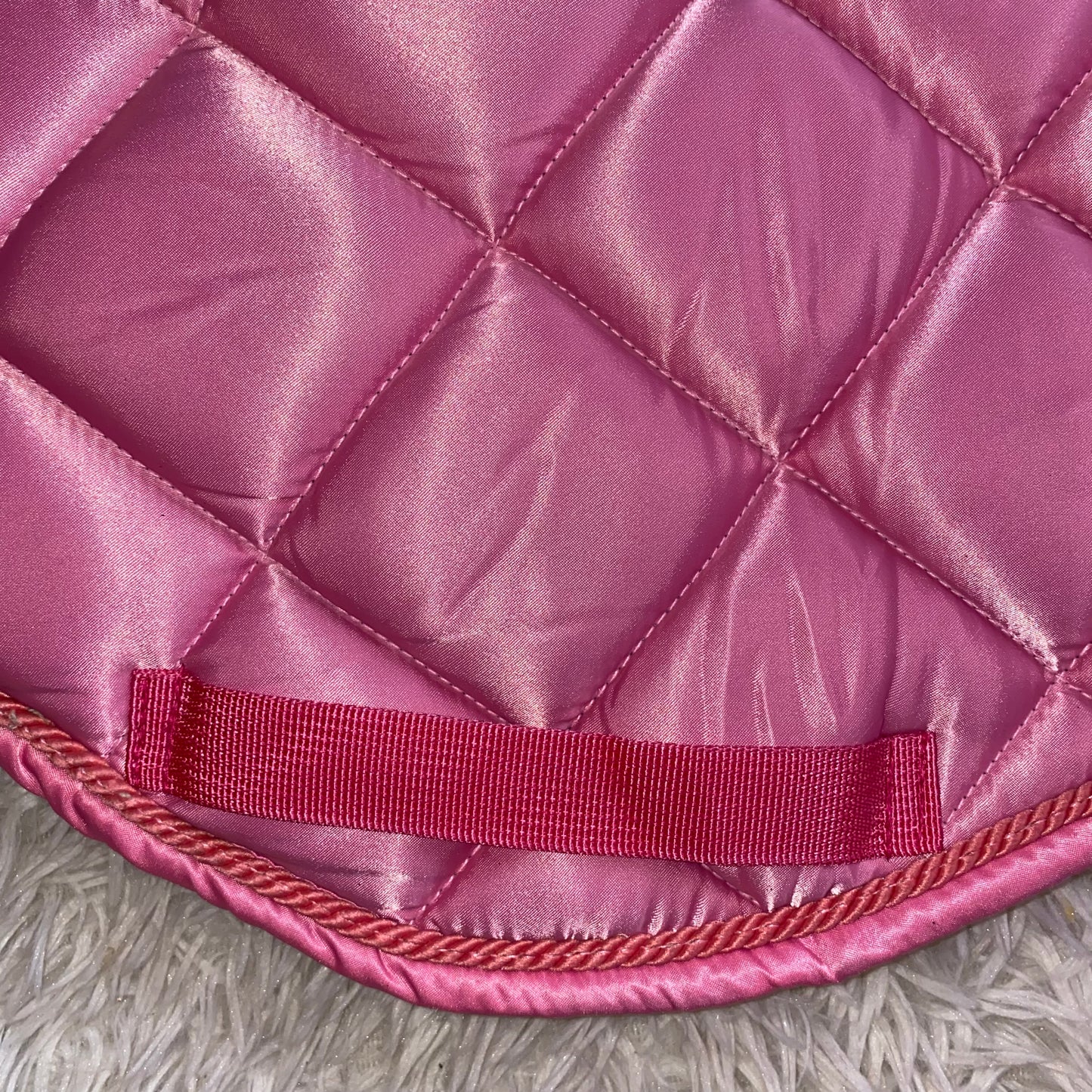 Sottosella e cuffietta rosa da salto