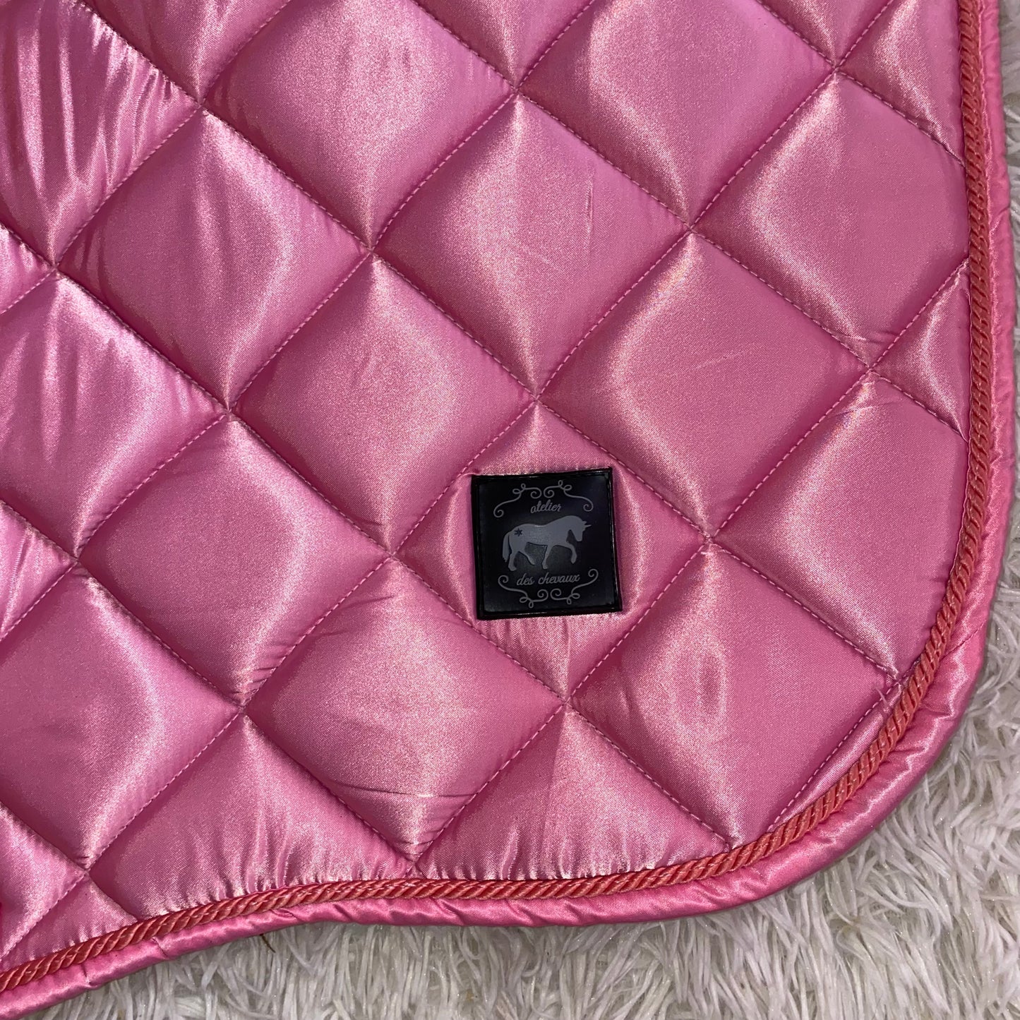 Sottosella e cuffietta rosa da salto