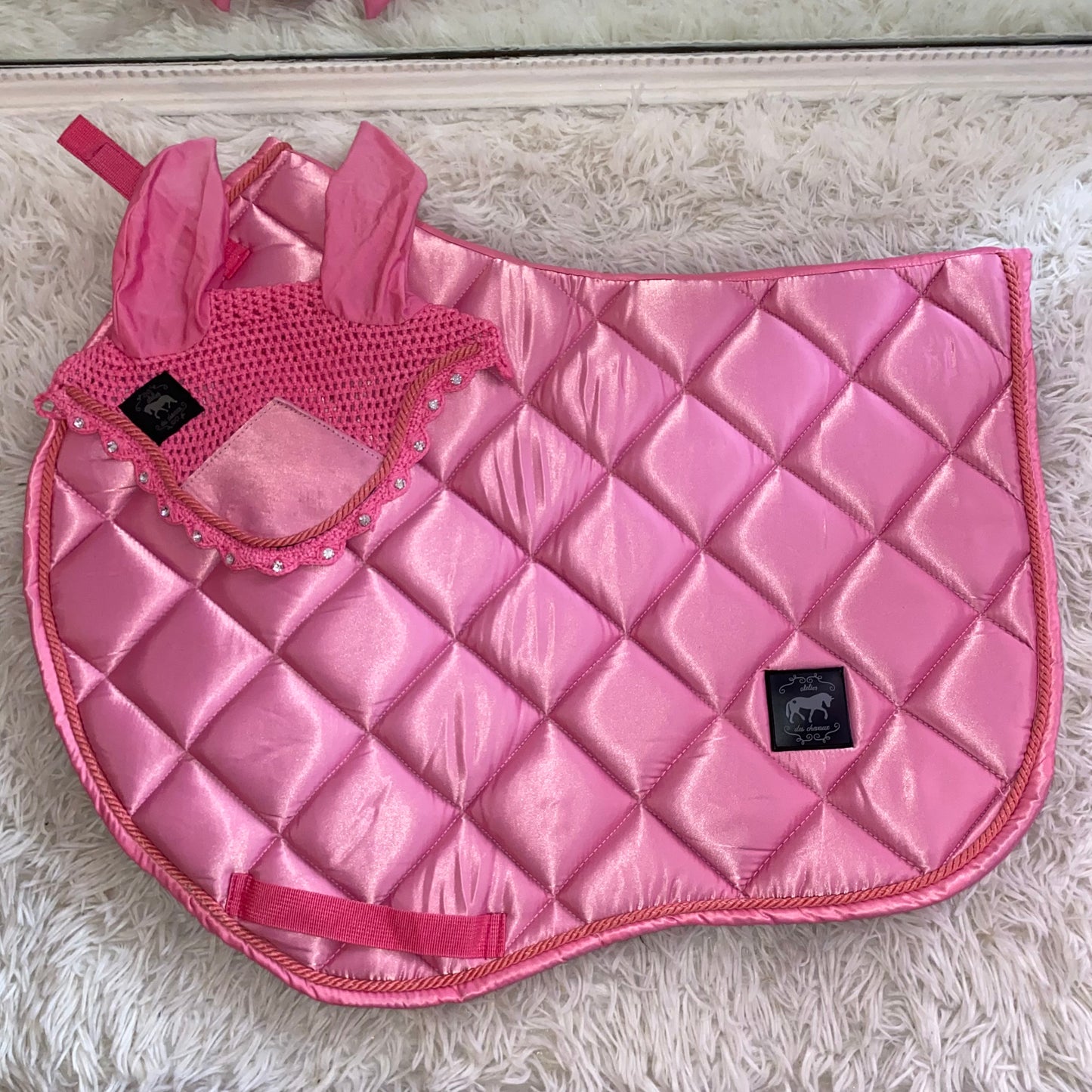 Sottosella e cuffietta rosa da salto